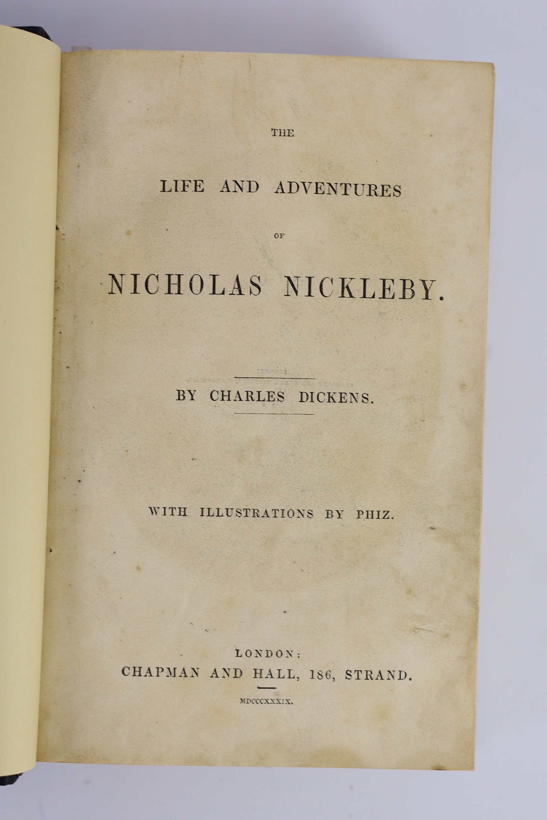 Dickens, Charles - Nicholas Nickleby, 1st edition in book form, 1st state, stab holes present, 8vo, later black calf with blue cloth boards, illustrated with 39 plates by Halbot K.Browne (‘’Phiz’’), neat repair to torn p